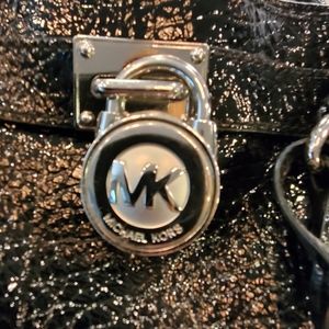 Black Michael Kors crocodile patent leather bag, wallet, and wristlet